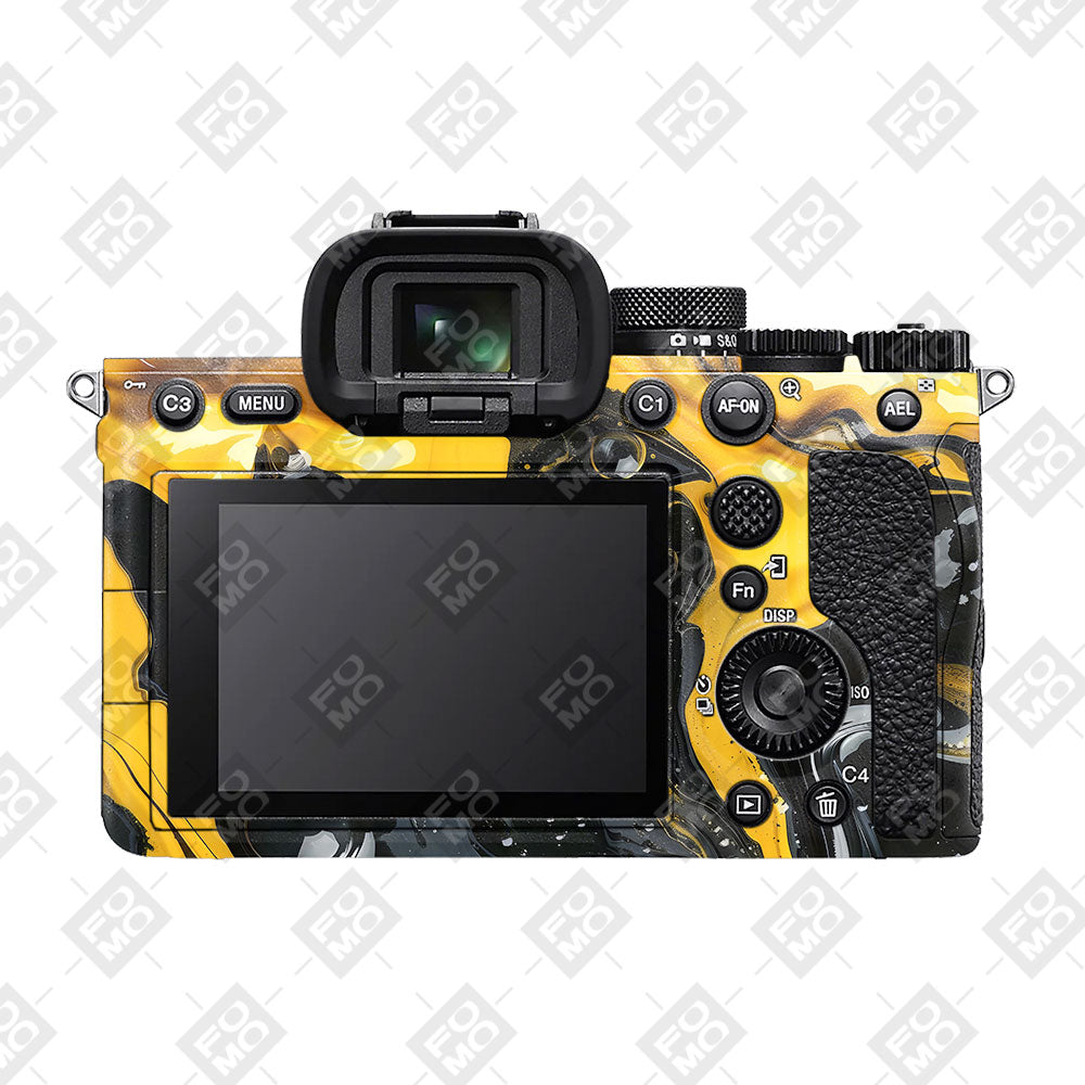 Yellow and Black Paint Swirls Sony A7MIV Camera Skins