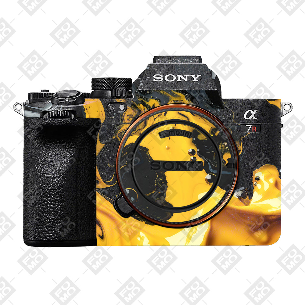 Yellow and Black Paint Swirls Sony A7RV Camera Skins