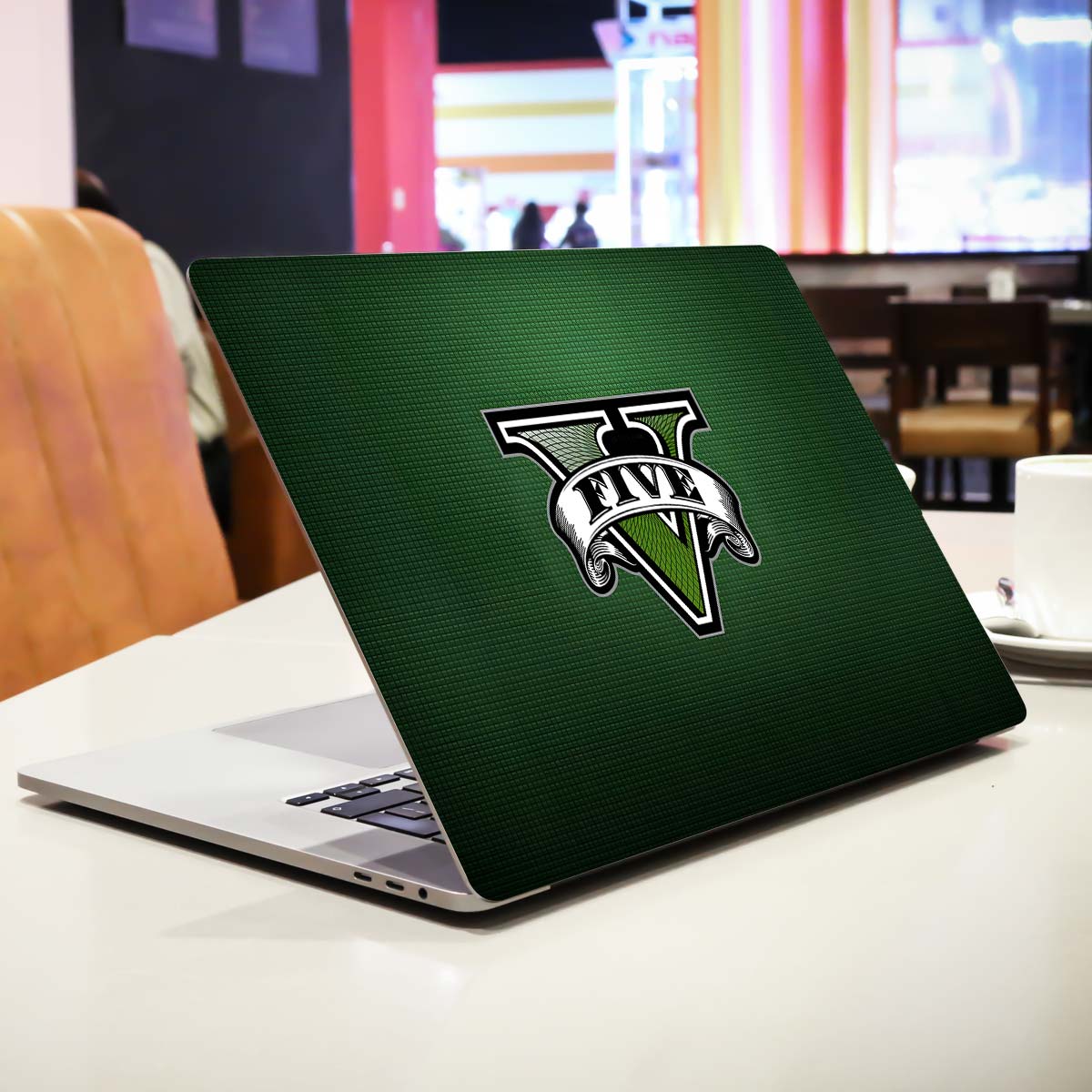 GtA 5 in Green Backdrop Gaming Laptop Skin
